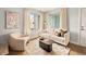 Cozy living room featuring a neutral color palette, contemporary furniture, and ample natural light from the large windows at 7946 Chase Cir # 112, Arvada, CO 80003