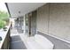 Spacious balcony with seating area and exterior views at 799 Dahlia St # 201, Denver, CO 80220