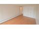 Bright bedroom features wood floors and closet space at 799 Dahlia St # 201, Denver, CO 80220