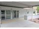 Building entrance featuring glass doors and a covered walkway for easy access at 799 Dahlia St # 201, Denver, CO 80220