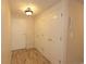 Neutral entryway featuring coat closet, ceiling light and tile flooring at 799 Dahlia St # 201, Denver, CO 80220