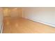 Open floor plan featuring neutral walls and hardwood floor at 799 Dahlia St # 201, Denver, CO 80220
