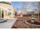 Relaxing backyard patio with seating area and fountain at 6716 W 97Th Cir, Broomfield, CO 80021