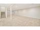 Finished basement with neutral carpeting and ample space at 6716 W 97Th Cir, Broomfield, CO 80021