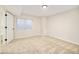 Spacious finished basement bedroom with a window and closet at 6716 W 97Th Cir, Broomfield, CO 80021