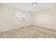 Cozy carpeted bedroom with a window offering natural light at 6716 W 97Th Cir, Broomfield, CO 80021