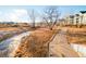 Paved walking trail alongside a creek at 6716 W 97Th Cir, Broomfield, CO 80021