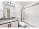 Bathroom with granite countertop, single sink, and tub shower at 897 S Granby Cir, Aurora, CO 80012