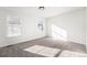 Well-lit bedroom with carpet and neutral walls at 897 S Granby Cir, Aurora, CO 80012