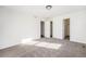 Bright bedroom with carpet flooring and ample closet space at 897 S Granby Cir, Aurora, CO 80012