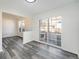 Open dining area with sliding glass doors leading to a patio at 897 S Granby Cir, Aurora, CO 80012