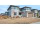 Beautiful two-story home with a well-maintained front yard at 211 Luna Ct, Erie, CO 80516