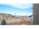 Picturesque street view showcases charming homes and distant mountain scenery at 211 Luna Ct, Erie, CO 80516
