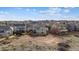 Aerial view of the home surrounded by an open space at 9957 Candlewood Ln, Highlands Ranch, CO 80126