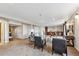Spacious finished basement area with bar, living area, carpet flooring and neutral paint at 9957 Candlewood Ln, Highlands Ranch, CO 80126