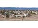 Scenic view of a suburban neighborhood with beautiful homes and picturesque mountain views in the background at 9957 Candlewood Ln, Highlands Ranch, CO 80126