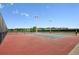 Community tennis courts are ready for a match, featuring well-maintained surfaces at 9957 Candlewood Ln, Highlands Ranch, CO 80126