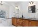 Bathroom with soaking tub and double vanity at 1312 Jade Ln, Longmont, CO 80504