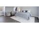 Bright bedroom with king-size bed, and an en-suite bathroom at 1312 Jade Ln, Longmont, CO 80504