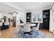 Dining area with round table and chairs, open to kitchen at 1312 Jade Ln, Longmont, CO 80504