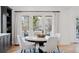 Casual dining area with french doors leading to backyard at 1312 Jade Ln, Longmont, CO 80504