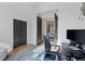 Home office with built-in desk and window seat at 1312 Jade Ln, Longmont, CO 80504