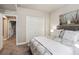 Bedroom featuring plush bedding, a closet, and a carpeted floor, creating a serene and inviting space at 878 Tree Bark Ter, Colorado Springs, CO 80132