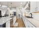 Spacious kitchen with modern appliances, ample counter space, and custom cabinetry at 878 Tree Bark Ter, Colorado Springs, CO 80132