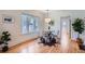 Dining room featuring hardwood floors and a large window at 764 S Sherman St, Denver, CO 80209
