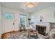 Cozy living room featuring a fireplace and bright natural light at 764 S Sherman St, Denver, CO 80209
