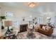 Bright living room with hardwood floors and a decorative fireplace at 764 S Sherman St, Denver, CO 80209