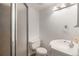 Bathroom with a shower, toilet, and a white sink vanity at 1150 Inca St # 59, Denver, CO 80204