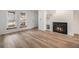 Living room with hardwood floors and a fireplace at 1150 Inca St # 59, Denver, CO 80204