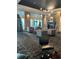 Elegant lobby with fireplace, comfortable seating and large windows at 1150 Inca St # 59, Denver, CO 80204