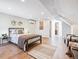 Spacious bedroom featuring laminate flooring, recessed lighting, and neutral paint at 1076 Mariposa St, Denver, CO 80204