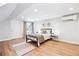 Spacious bedroom with recessed lighting and laminate flooring and large window at 1076 Mariposa St, Denver, CO 80204