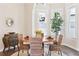 Bright dining room with dark floors and large windows at 1076 Mariposa St, Denver, CO 80204