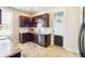 Well-lit kitchen features granite countertops, modern appliances, and ample cabinet space at 1076 Mariposa St, Denver, CO 80204