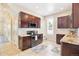 Kitchen features granite countertops, stainless steel appliances, and abundant cabinet space at 1076 Mariposa St, Denver, CO 80204