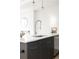 Close up on modern kitchen island with stainless steel dishwasher, quartz counter top and spring faucet at 1206 S Reed St, Lakewood, CO 80232
