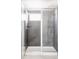 Enclosed glass shower with gray tiles and a small window at 1206 S Reed St, Lakewood, CO 80232