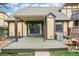 Backyard patio featuring wooden deck, covered awning, table and chairs at 18538 E Whitaker Cir # A, Aurora, CO 80015
