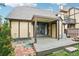 Backyard patio with a wooden deck and cover, blending indoor and outdoor living at 18538 E Whitaker Cir # A, Aurora, CO 80015