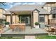 Backyard patio featuring wooden deck, covered awning, table and chairs at 18538 E Whitaker Cir # A, Aurora, CO 80015