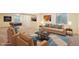 Finished basement featuring a pool table, a sofa, a rug and two chairs at 18538 E Whitaker Cir # A, Aurora, CO 80015
