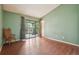 Spacious bedroom with vaulted ceiling, large sliding door, and natural light at 18538 E Whitaker Cir # A, Aurora, CO 80015