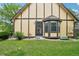 Charming home with tan siding, black trim, bay window, and well-maintained front lawn at 18538 E Whitaker Cir # A, Aurora, CO 80015