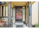 Inviting front entrance featuring a decorative security door and stone accents around the entryway at 18538 E Whitaker Cir # A, Aurora, CO 80015