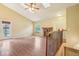Inviting living room featuring a cozy fireplace, hardwood floors, and natural light at 18538 E Whitaker Cir # A, Aurora, CO 80015