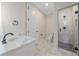 Updated bathroom with vanity, marble countertops, and a glass-enclosed shower at 24701 Us Hwy 40, Golden, CO 80401
